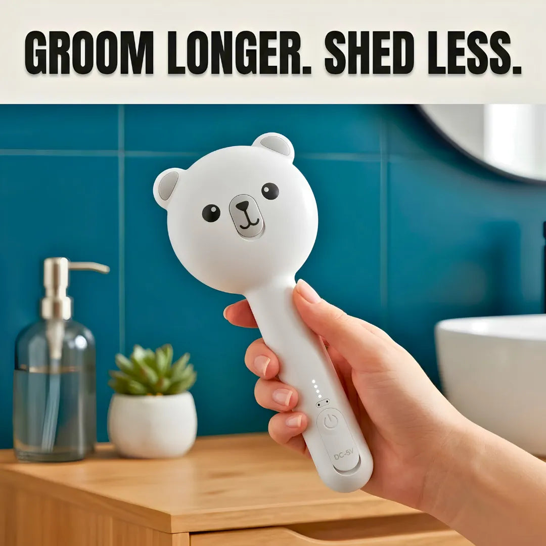 Hand holding a white grooming tool with a bear design, text 'Groom Longer. Shed Less.' in a bathroom setting.