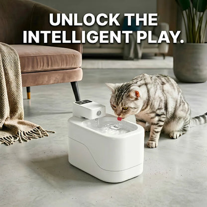 Cat drinking from a white pet fountain in a living room setting with text 'Unlock the Intelligent Play'.